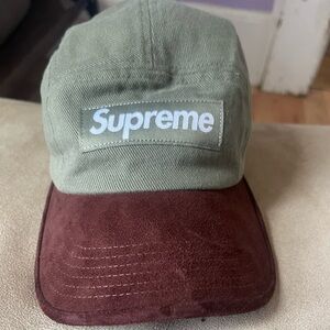 Green and brown supreme hat